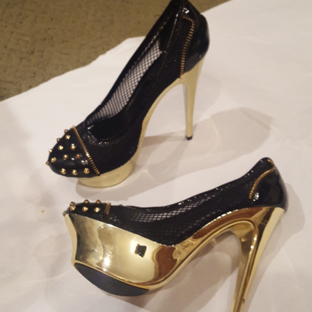 Fishnet and gold heels